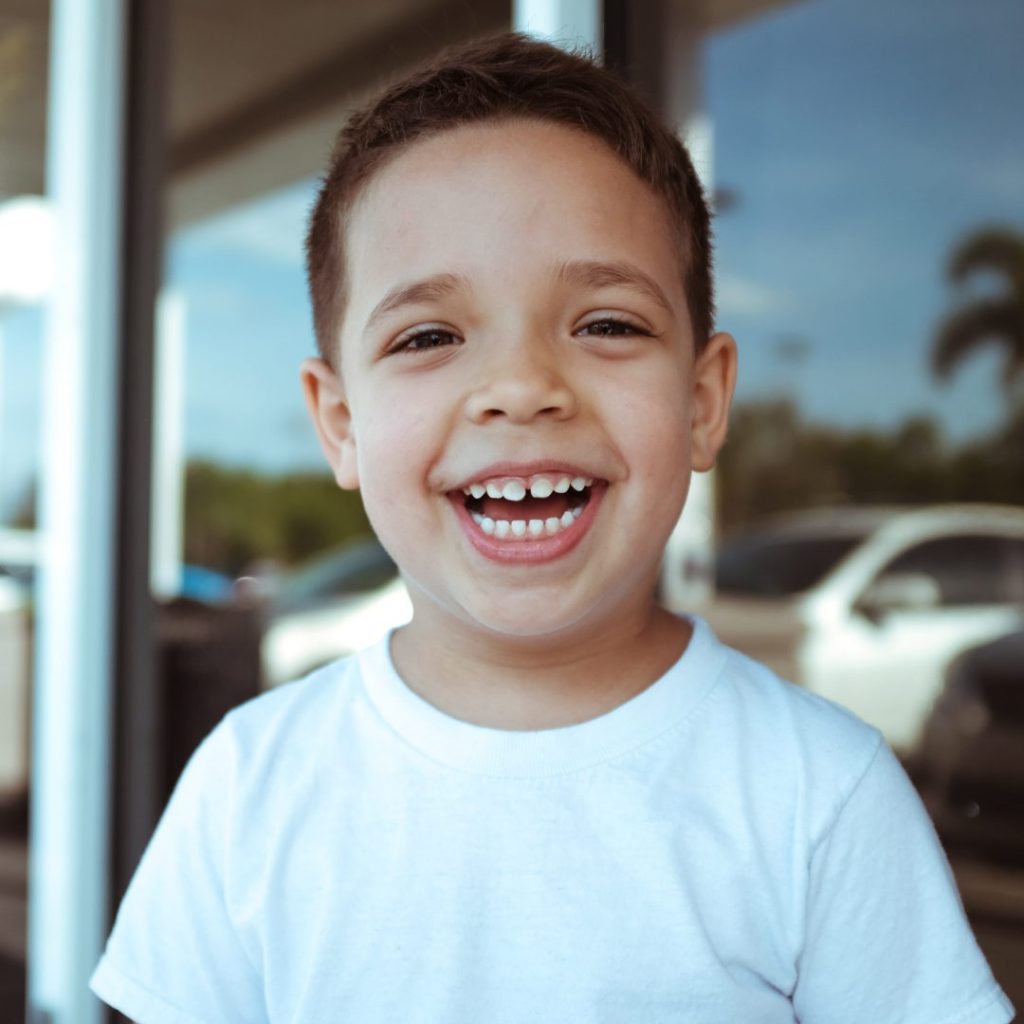 young boy smiling