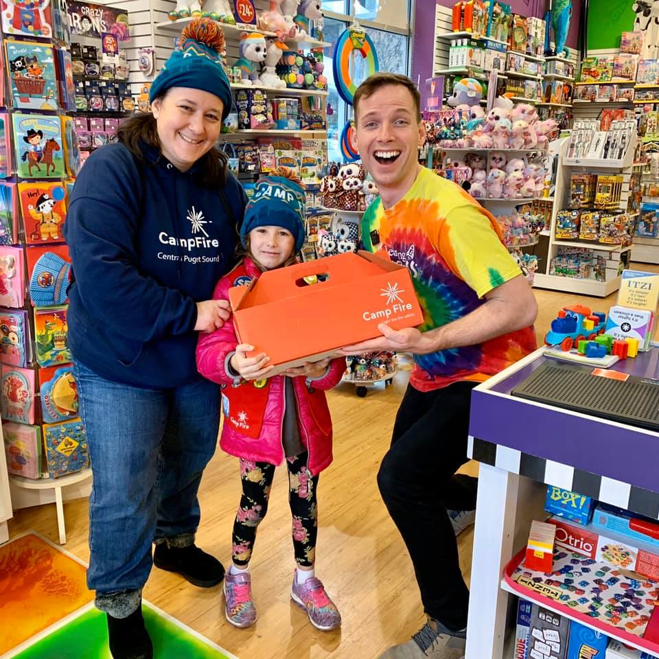 Camp Fire Central Puget Sound selling candy at a toy store