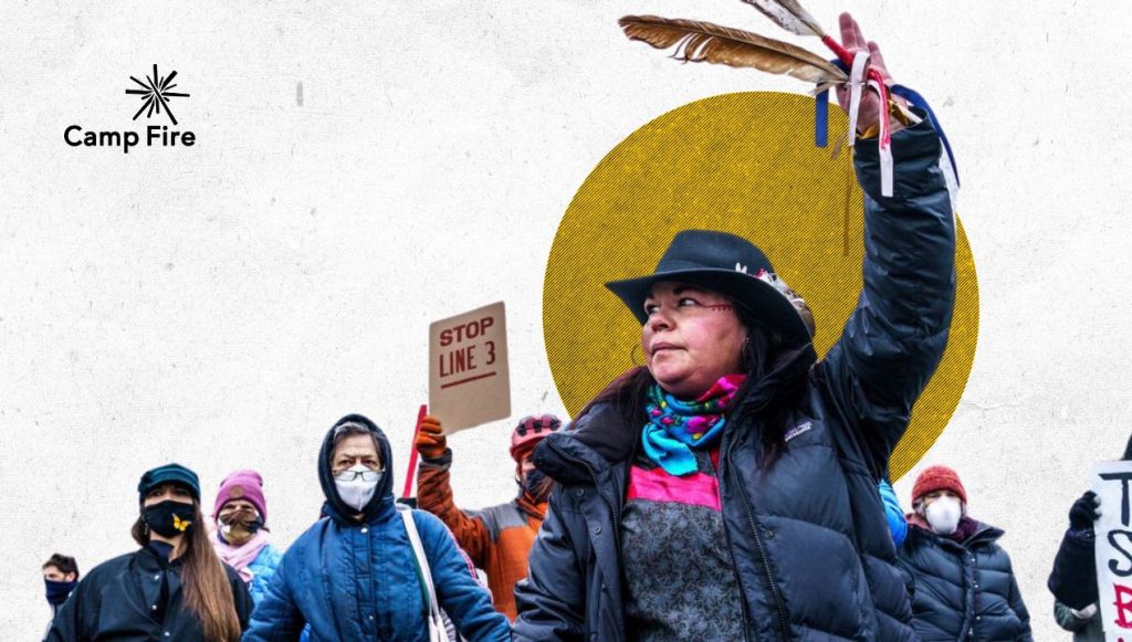 Sarah LittleRedfeather of Honor the Earth dances with an eagle feather in front of the construction site for the Line 3 oil pipeline near Palisade, Minnesota, on January 9, 2021. Kerem Yucel/AFP via Getty Images