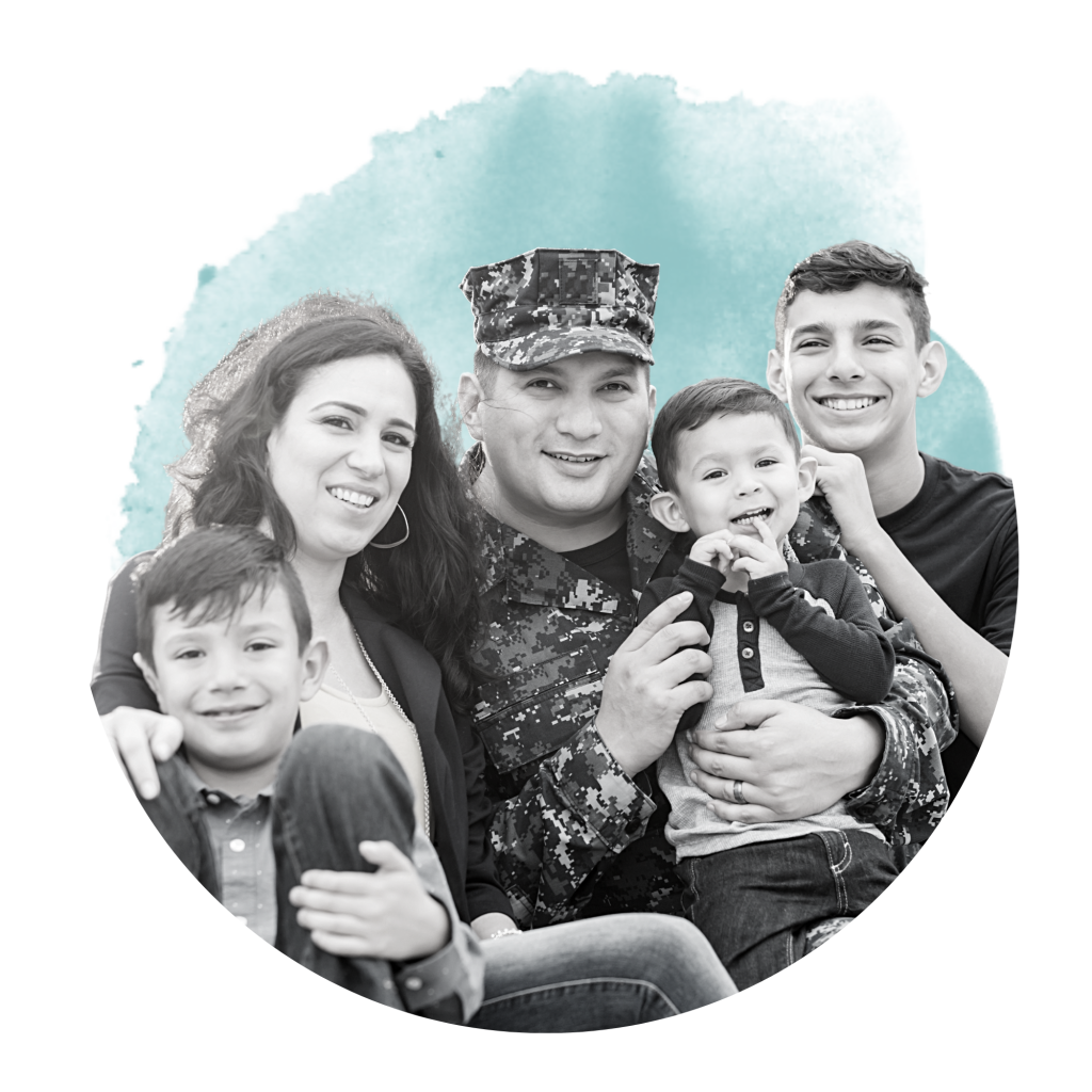 Photo of military family together smiling with blue paint cirlce behind them